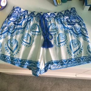White with blue pattern shorts